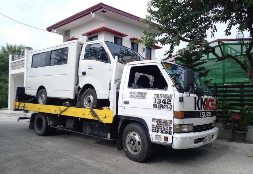 towing L300 using towing truck service